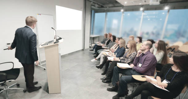 istock businessman conducts training for the business team 1217359541