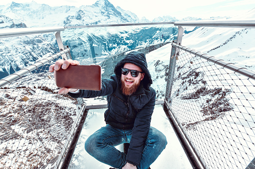 Bearded Male Taking Selfie On First Cliff Walk Near Grindelwald, Switzerland