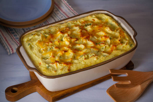 Creamy fish pie or fisherman's pie - traditional British and Irish dish Creamy fish pie or fisherman's pie - traditional British and Irish dish. horizontal image fish pie stock pictures, royalty-free photos & images