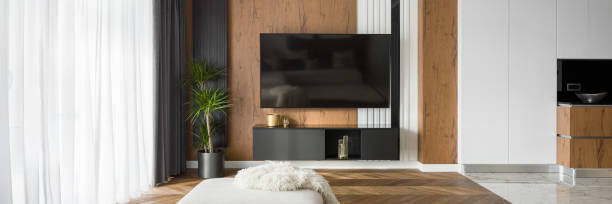 istock Living room with tv, panorama 1217361244