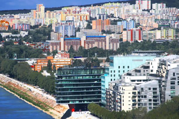 View of River Park complex foreground and residential district on the background in Bratislava, Slovakia. Architect of the complex is Erick van Egeraat. Complex consists of Kempinski Grand Hotel, apartments, bank, offices, shops, etc