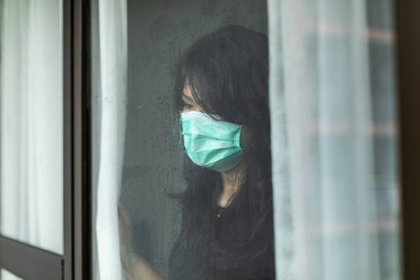 istock woman in isolation at home for virus outbreak or hypochondria 1217361792