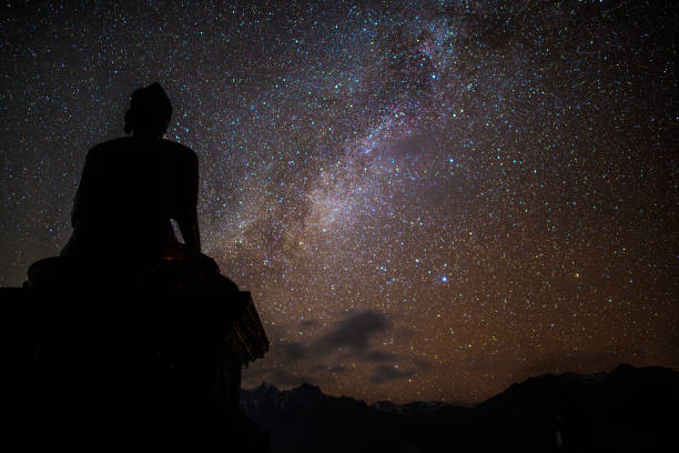 istock Buddhist temple meditation with Milky Way night sky stars 1217362781