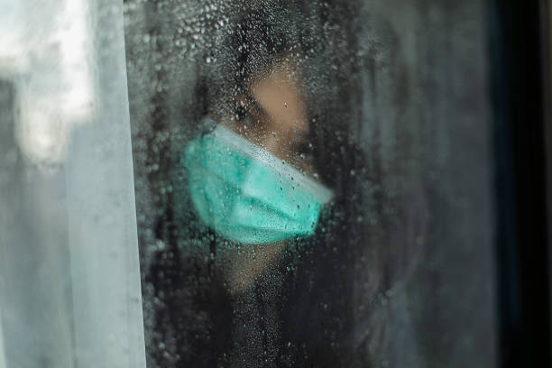istock woman in isolation at home for virus outbreak or hypochondria 1217363071