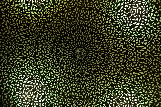 Moroccan, Arabian lamp with intricate decor with mint green light. Concept for Moroccan and Arabian culture and design.
