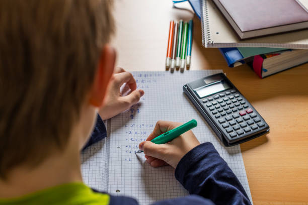 istock teenager doing homework 1217370002