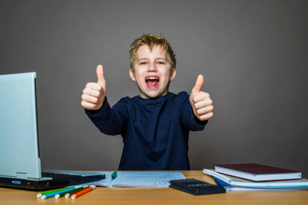istock teenager doing homework - thumbs up 1217370120