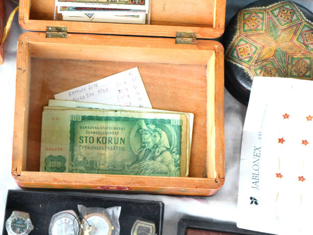 100 kronas of Czechoslovakia in wooden casket on open air market of vintage things on the site of Red stone castle Casta, Slovakia - August 31, 2019: 100 kronas of Czechoslovakia in wooden casket on open air market of vintage things on the site of Red stone castle former czechoslovakia stock pictures, royalty-free photos & images