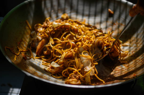 istock Asian style Stir Fried Noodle in Wok 1217374581