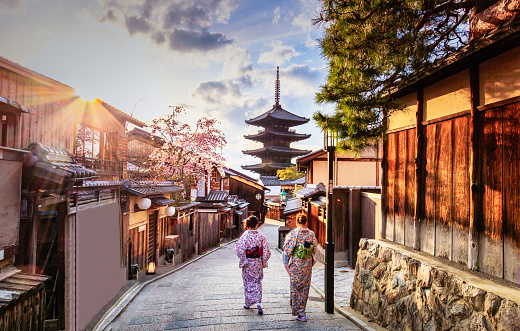 Kyoto - Japan - April 9, 2017:Yasaka Pagoda and Sannen Zaka Street, Kyoto, Japan. Tourists wander down the narrow streets of the Higashiyama District neighbourhood in Kyoto, Japan