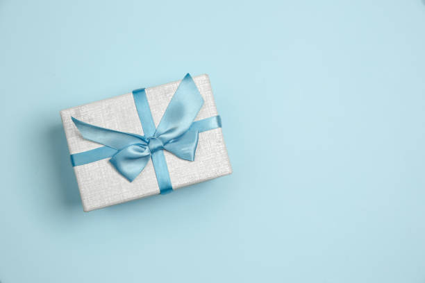 istock Gift, present box. Monochrome stylish composition in blue color. Top view, flat lay. 1217378294