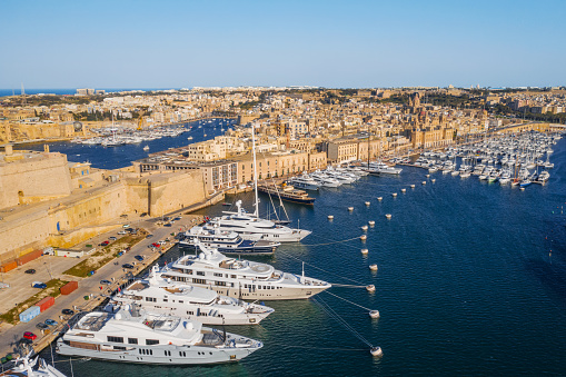 Aerial top view of Birgu or Vittoriosa - famous city in Malta island. Marina bay, yachts, boats