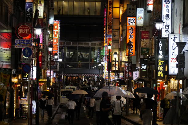 istock Crowded street in Tokyo at night 1217383778
