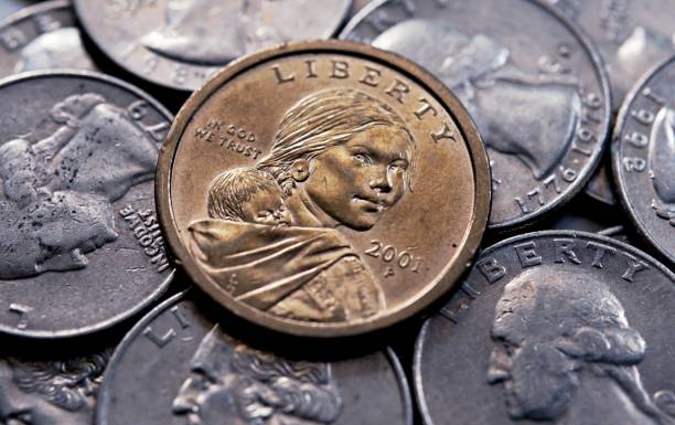 istock one dollar united state coin background 1217384081
