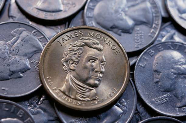 istock one dollar united state coin background 1217384469