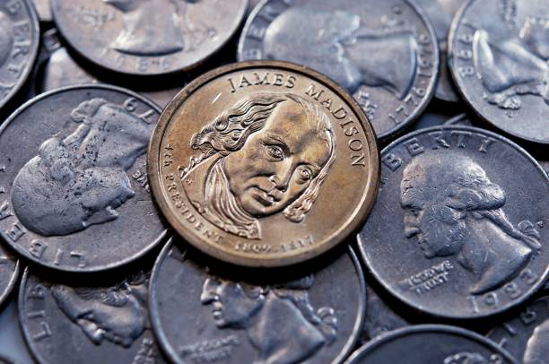 istock one dollar united state coin background 1217384826