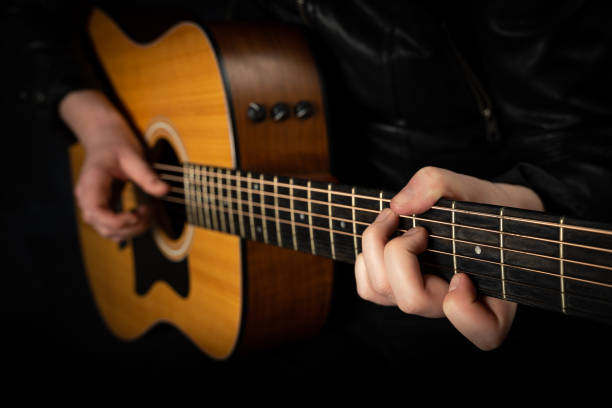 istock Playing an acoustic guitar. 1217386014