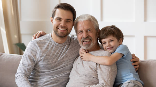 istock Three generations of men relax at home together 1217386113