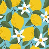 istock Tropical seamless pattern with yellow lemons. Fruit repeated background. Vector bright print for fabric or wallpaper. 1217388124