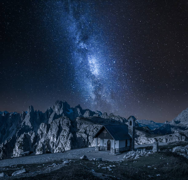 istock Milky wa over small chapel in Dolomites, Italy 1217388176