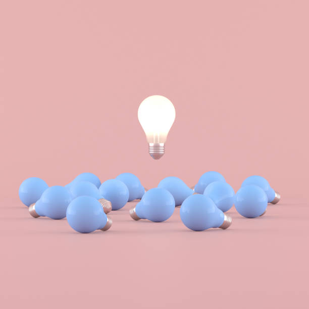istock Minimal conceptual idea of light bulb floating around the blue bulbs on pink background. 3D rendering. 1217389730