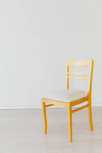 istock one chair in the interior of an empty white room 1217390094