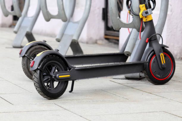 istock Electric scooters in a row on the parking lot 1217390472