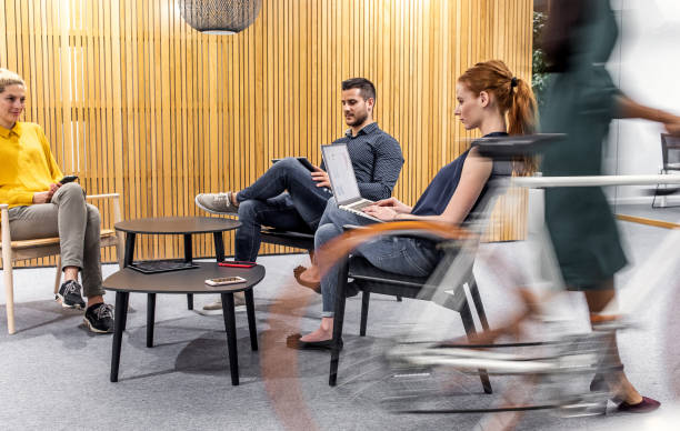 istock Business people sitting in the lobby 1217390894