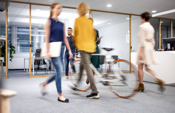 istock Business people walking in the lobby 1217391754