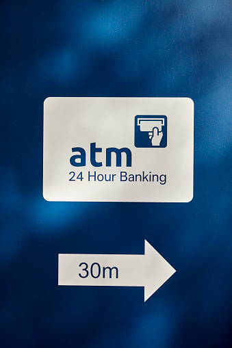 atm bank direction sign, 24 hour service