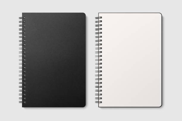 istock Real photo, spiral bound notepad mockup template with black paper cover, isolated on light grey background 1217393673