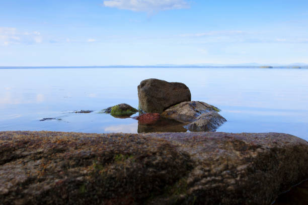 istock Stone path on the lake shore 1217394195