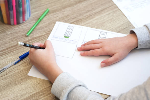 istock Close-up boy studying  and doing school homework. Distance learning online education or stay at home concept. Soft focus. 1217398751