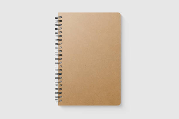 istock Real photo, blank spiral bound notepad mockup template with Kraft Paper cover, isolated on light grey background. 1217399994