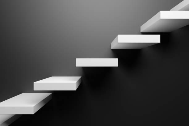 istock Ascending white stairs in black room black abstract 3D illustration 1217400629