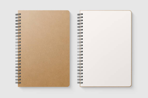 istock Real photo, blank spiral bound notepad mockup template with Kraft Paper cover, isolated on light grey background. 1217400643