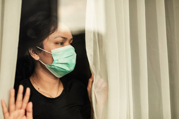 istock woman in isolation at home for virus outbreak or hypochondria 1217403821