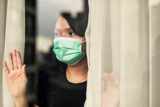 istock woman in isolation at home for virus outbreak or hypochondria 1217403859