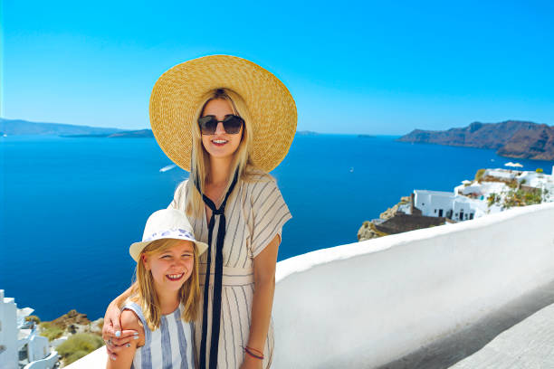istock Mother and daughter on Santorini 1217404139