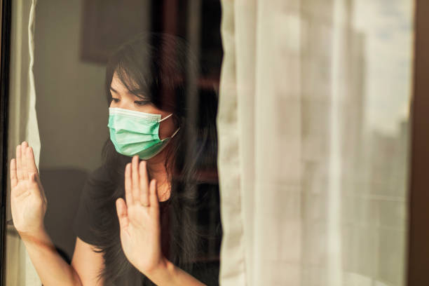 istock woman in isolation at home for virus outbreak or hypochondria 1217405722