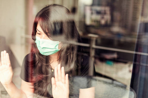 istock woman in isolation at home for virus outbreak or hypochondria 1217407313