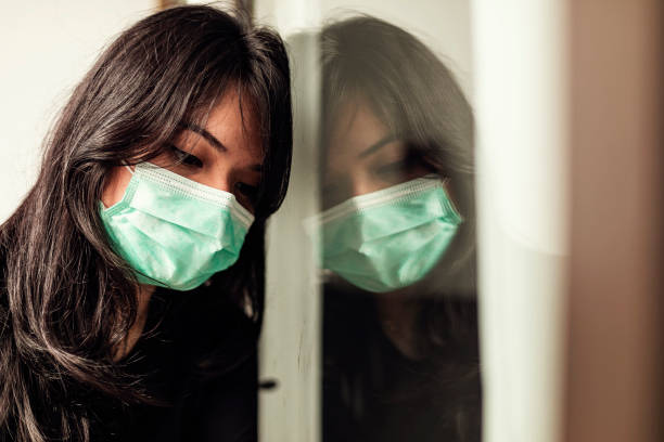 istock woman in isolation at home for virus outbreak or hypochondria 1217407322