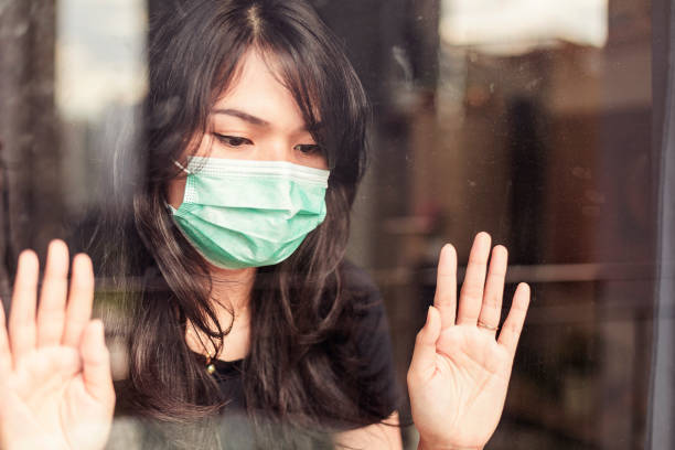 istock woman in isolation at home for virus outbreak or hypochondria 1217407332