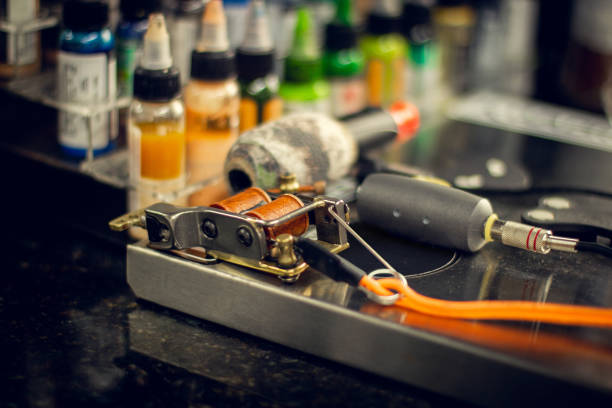 istock Closeup of some tattoo equipment on a studio. 1217411919