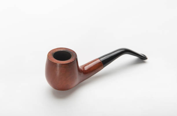 Tobacco pipe Tobacco pipe on white pipe smoking pipe stock pictures, royalty-free photos & images