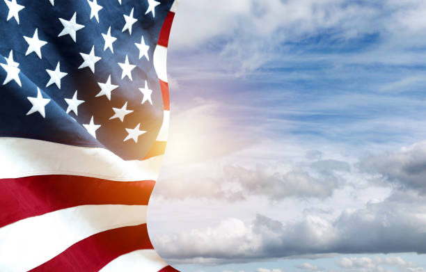 istock American flag in sky 1217414894