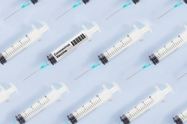 istock Coronavirus COVID-19 Vaccine in Syringe 1217415192