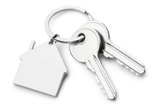 Blank house shaped keychain with two keys on white