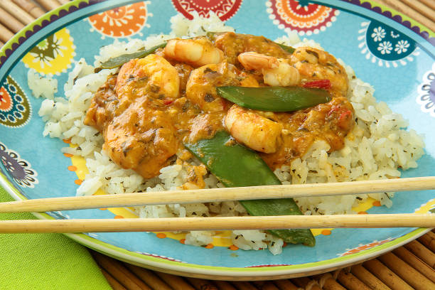 istock shrimp with red curry and rice 1217421418
