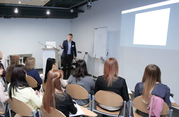 istock Manager makes a presentation to his business team 1217423842